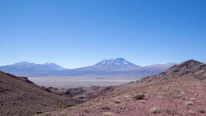 Fototapeta na wymiar View to the Paniri volcano from the road from Calama to Caspana, Antofagasta region