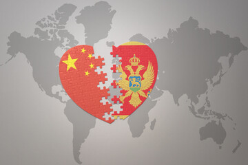 puzzle heart with the national flag of china and montenegro on a world map background. Concept.