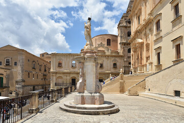 A statue in a small square of Noto in Sicily, a city declared a World Heritage Site by UNESCO.