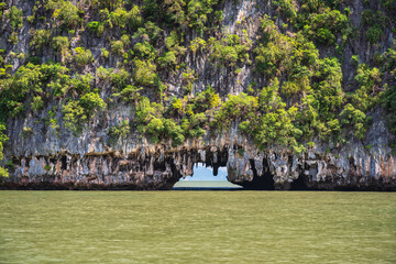 Tropical islands view at Tham Lod Cave with ocean blue sea water, Phang Nga Thailand nature...