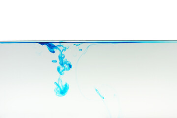 Color or ink in water on white background,Abstract smoke pattern,Colored liquid dye,Splash paint