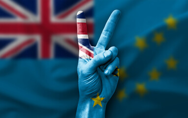 Hand making the V victory sign with flag of tuvalu