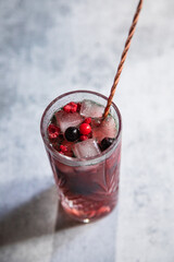 Pink berries lemonade in a clear glass