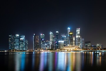 Fototapeta na wymiar Singapore May 22nd 2022 - Cityscape of the Singapore financial business district at night
