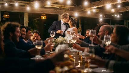 Beautiful Bride and Groom Celebrate Wedding at an Evening Reception Party. Newlyweds Propose a...