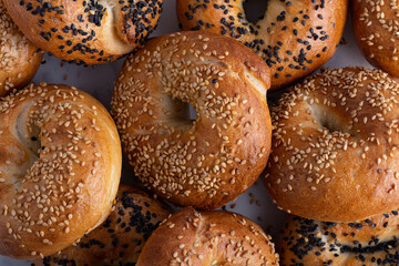 Assortment of soft bagels with sesame seeds