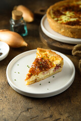 Traditional homemade French quiche with onion and bacon
