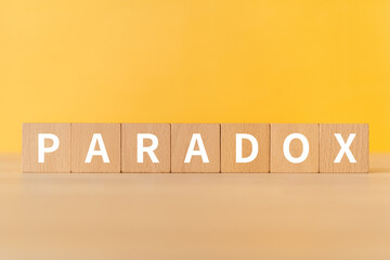 パラドックス・逆説のイメージ｜「PARADOX」と書かれた積み木