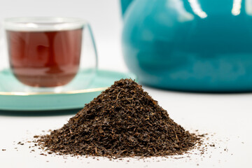 Black tea isolated on a white background. close up