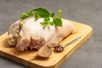 Raw chicken breast with spices and fresh parsley. Farm product, BIO poultry. Healthy food concept