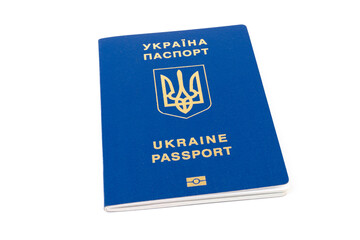 Fototapeta premium Ukrainian passport with a golden trident symbol on white background. Biometric Ukraine passport id empty place for photo or text.