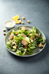 Homemade salad with croutons and salmon