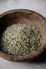 hempseed in a wooden bowl