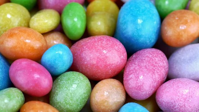 Pile of many round chewy candies dragee.