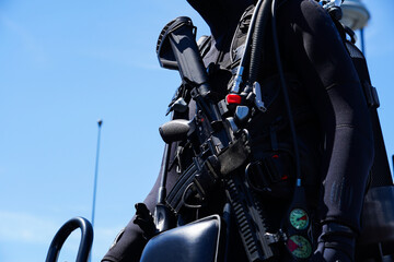 Silhouette of a male mannequin dressed in army soldiers with a weapon pointing to the enemies. Military and army industry.photo during the day.