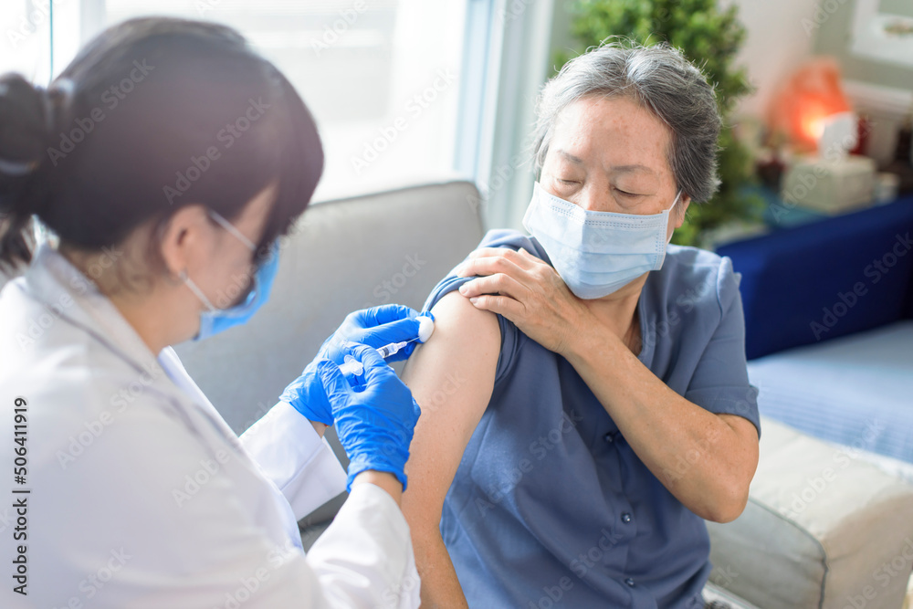 Sticker Senior woman receiving vaccine. Medical doctor vaccinating an elderly patient against flu, covid-19, pneumonia or coronavirus.