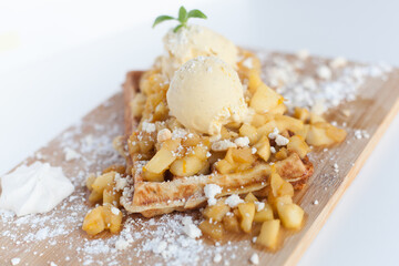 waffles with whipped ice cream and apple