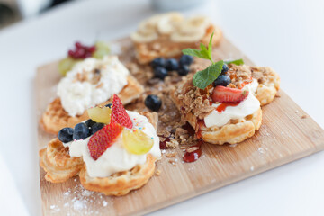waffles with whipped cream and fruit