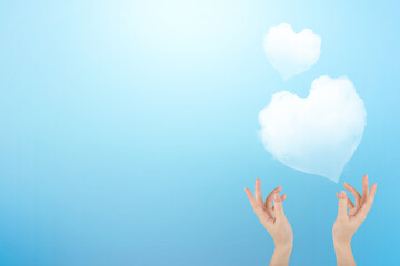 Your hands and clouds heart shaped (World Ozone Day Concept)