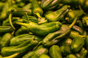 Background of Padron bell pepper (Capsicum annuum), in a market in La Coruña, Spanish gastronomy, food and drink concept.