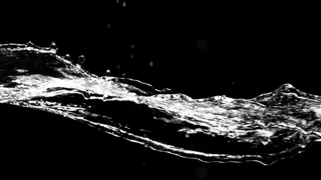 Super slow motion of splashing water rotation isolated on black background. Filmed on high speed cinema camera, 1000 fps.