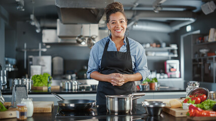 TV Cooking Show in Restaurant Kitchen: Portrait of Black Female Chef Talks, Teaches How to Cook...
