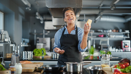 TV Cooking Show in Restaurant Kitchen: Portrait of Black Female Celebrity Chef Talks, Teaches Fun...