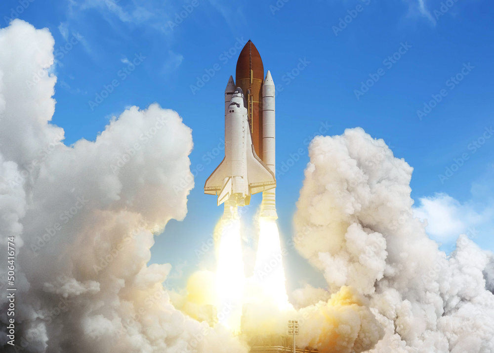 Wall mural new space shuttle rocket successfully launches and takes off into the blue sky