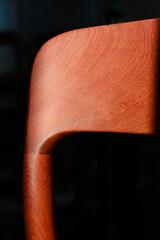 A danish mid century modern teak chair from the 60s vintage standing in the dining living room with...