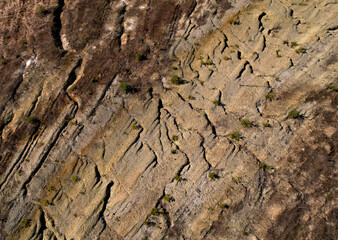Soil earth background, top view. Relief of cracked earth. Land structure of parched earth. Ground background and Rock texture after earthworks. Dry sand and cracked soil. Global natural disaster.