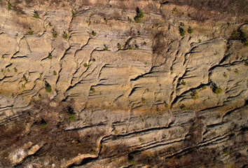 Soil earth background, top view. Relief of cracked earth. Land structure of parched earth. Ground background and Rock texture after earthworks. Dry sand and cracked soil. Global natural disaster.