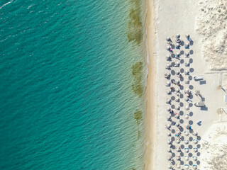 vertical drone shot of a sunny beach in MILO'S island,greece