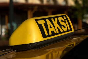 taxi sign on the street