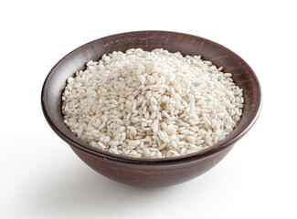 Uncooked arborio rice in ceramic bowl isolated on white background with clipping path