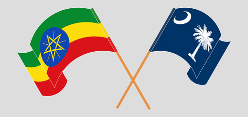 Crossed and waving flags of Ethiopia and The State of South Carolina