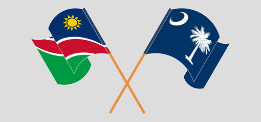 Crossed and waving flags of Namibia and The State of South Carolina