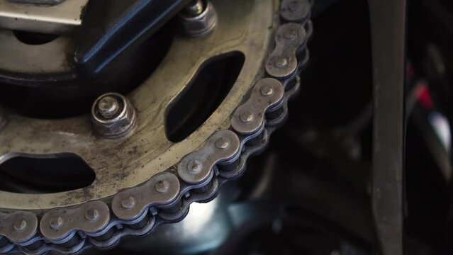 Rear sprocket with chain of a motorcycle