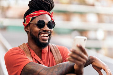 Cool Afro Boy Using Phone