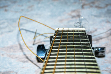 Guitar strings. Music instrument. Musical system. Classical guitar fingerboard. Musician's...