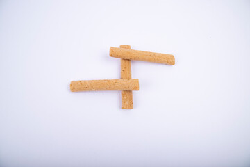 The dessert Roll wafer is isolated on white background.