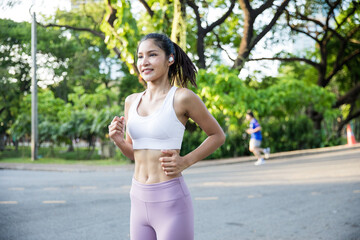 Fototapeta premium Asian lady exercise outdoors