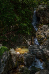 Naklejka na ściany i meble A hidden waterfall in Milies