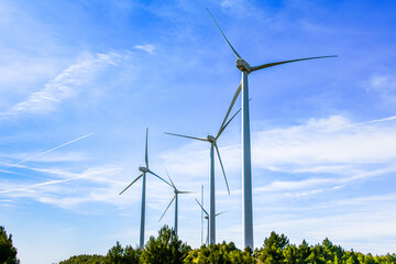 Windmills for the production of electrical energy. Wind farm of renewable, alternative and sustainable energy, province of Barcelona