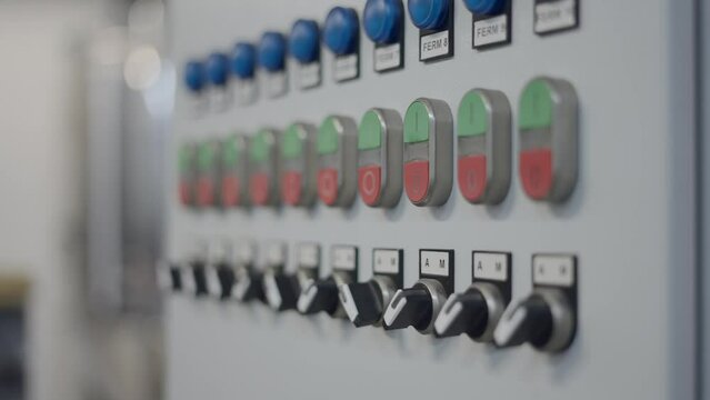 Multiple Process Control Table Buttons Inside A Beer Factory. Selective Focus