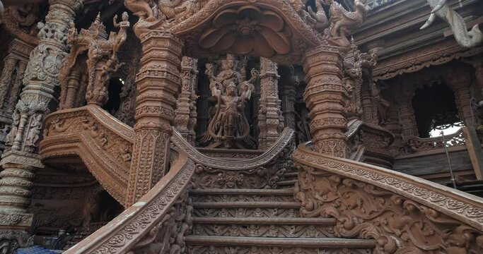 Interior Sanctuary of Truth (Prasat Sut Ja-Tum), beautiful wooden temple by the sea on the outskirts of Pattaya Thailand, Amazing Thailand travel concept.