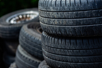 Old tyres in pile at tip for recycling