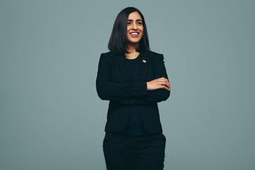 Cheerful congresswoman smiling in a studio