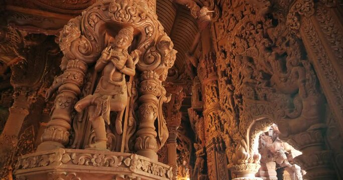 Interior Sanctuary of Truth (Prasat Sut Ja-Tum), beautiful wooden temple by the sea on the outskirts of Pattaya Thailand, Amazing Thailand travel concept.