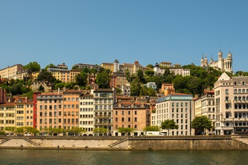 View of the basilica Fourviere at the top of hill and the river Rhône at the picturesque city of Lyon