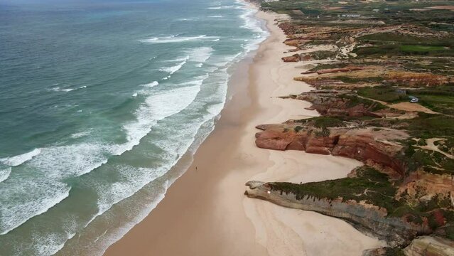 Aerial view of Beautiful ocean beach with cliffs in Portugal, Baleal